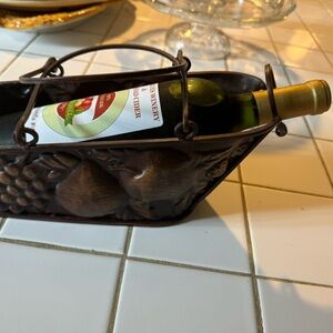 Wine rack with handles is Vintage bronzed metal with elegant fruit design